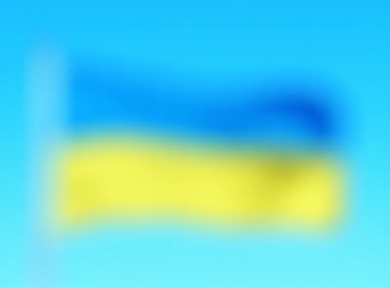 Image of the Ukrainian flag waving in the wind.